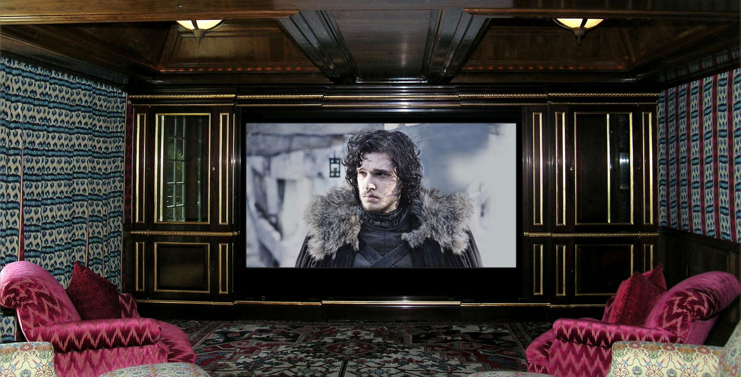 John Snow's stupid sad face on a home theater screen.