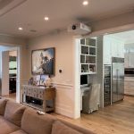 A living space featuring a smart projector.