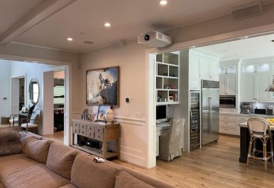 A living space featuring a smart projector.